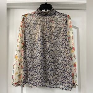 FAB ‘RIK  Sheer Hi-neck Metallic  Floral Blouse. Contemporary design